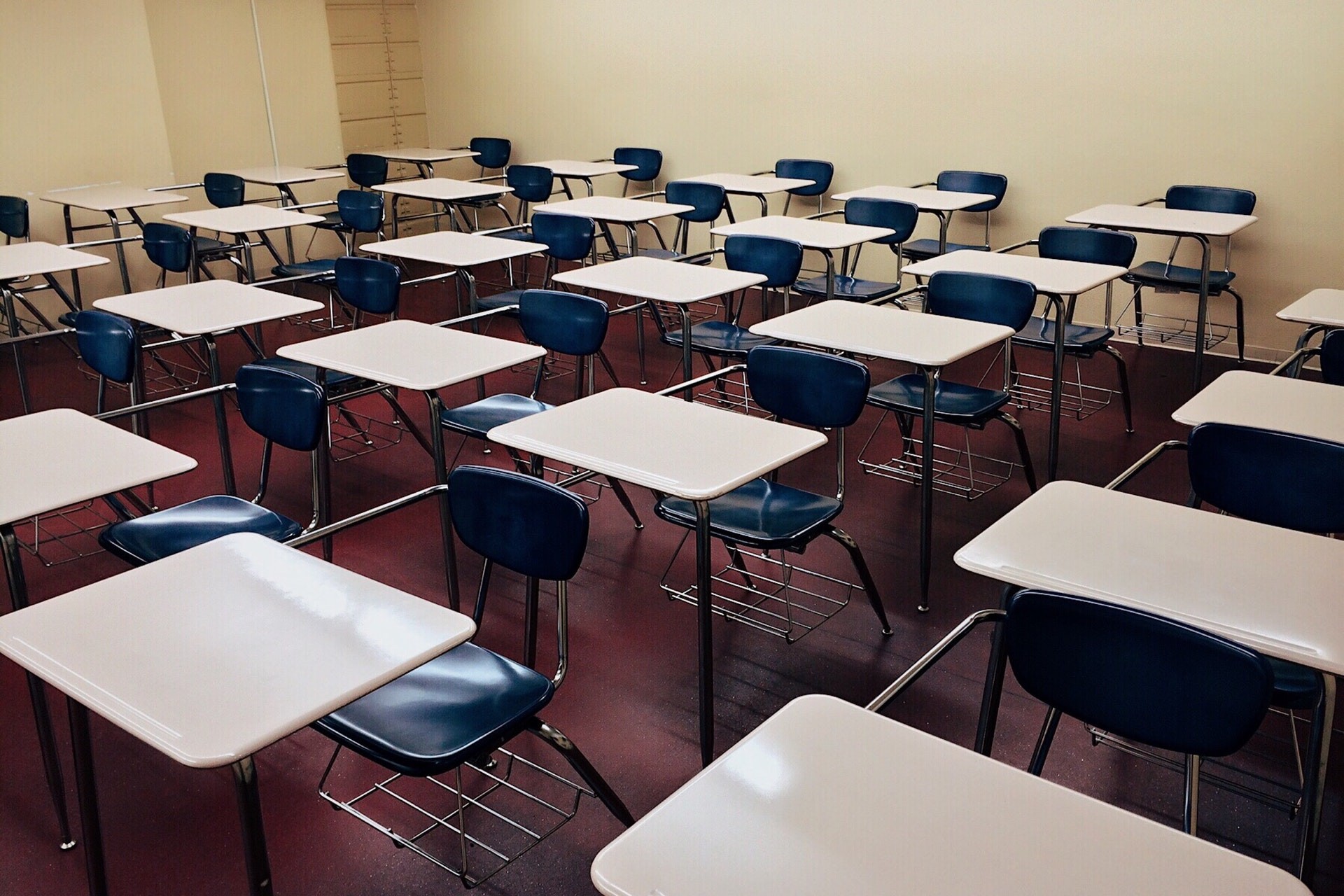 Empty desks in an empty classroom over summer.