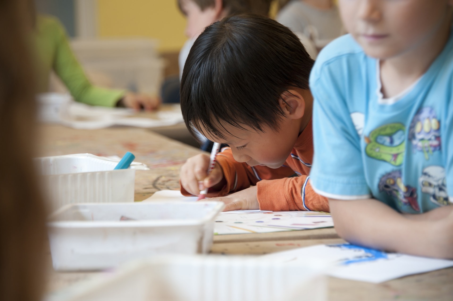 Students in a classroom working on activities that make math fun. 