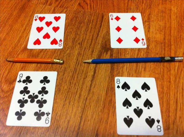 Illustrate Flip-it fractions by poker cards