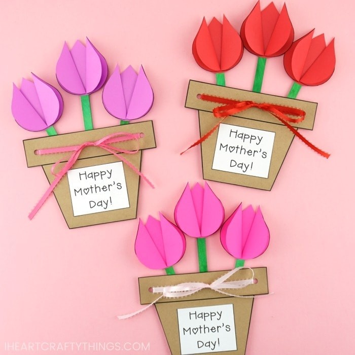 Flower pot cards that read "Happy Mother's Day" with pink, purple and red paper tulips.