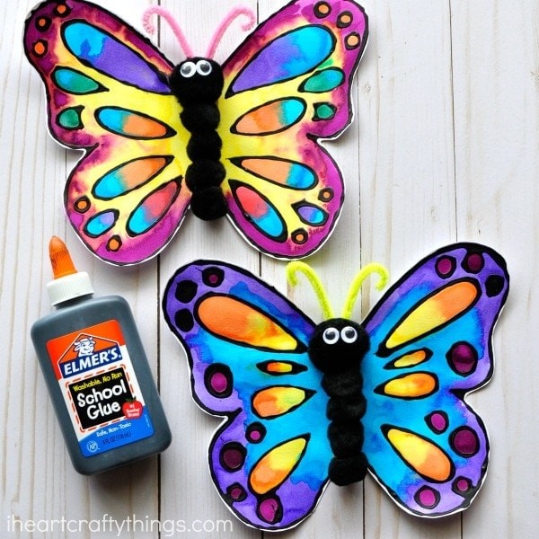 Colorful butterflies painted in watercolors.