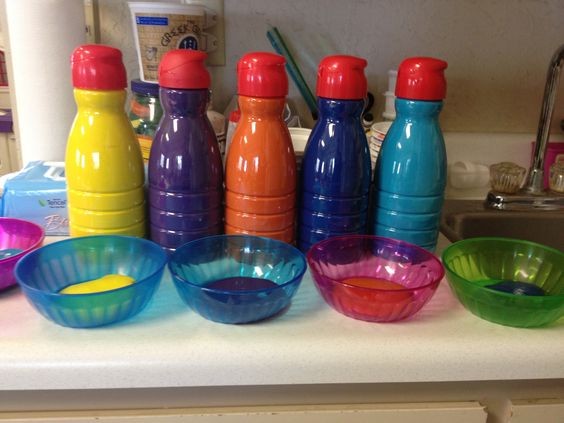 A great teacher hack that uses old coffee creamer bottles to store paint in an organized and clean way.