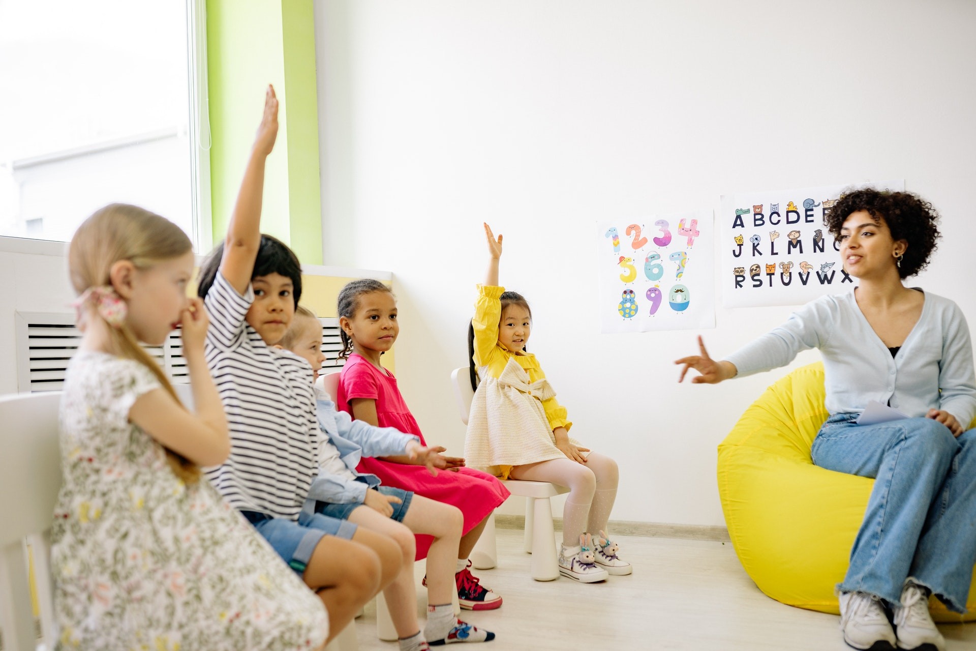 A teacher teaches students elementary math