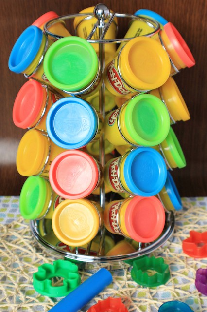 Coffee pod carousel holding tubs of play dough