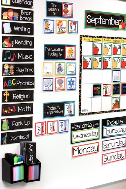 Whiteboard with labeled magnets to track schedule